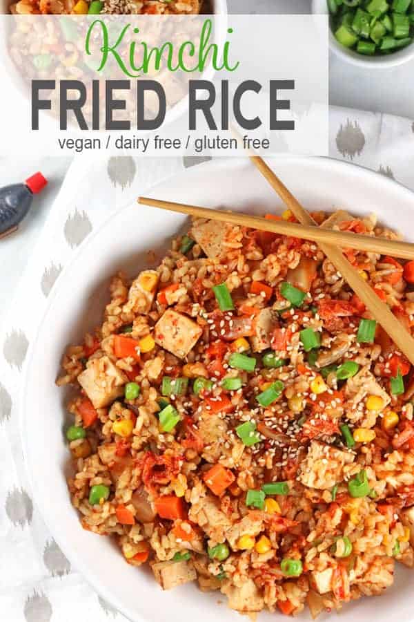 Kimchi Fried Rice | This Vegan Kimchi Fried Rice adds a pop of flavor to a traditional dish. The rice is not actually fried and it uses no oil so it's a healthy quick meal on busy nights. It's also vegan, gluten-free, fish-free, and comes together in about 15 minutes. gluten-free, dairy-free, vegan recipe, vegetarian, vegan kimchi recipe #veganfriedrice #healthyfriedrice #vegankimchifriedrice g
