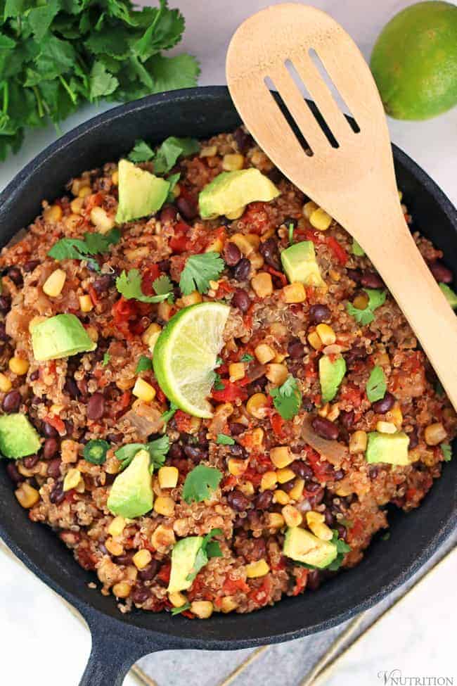 Southwest Quinoa salad in a black pan on a white table