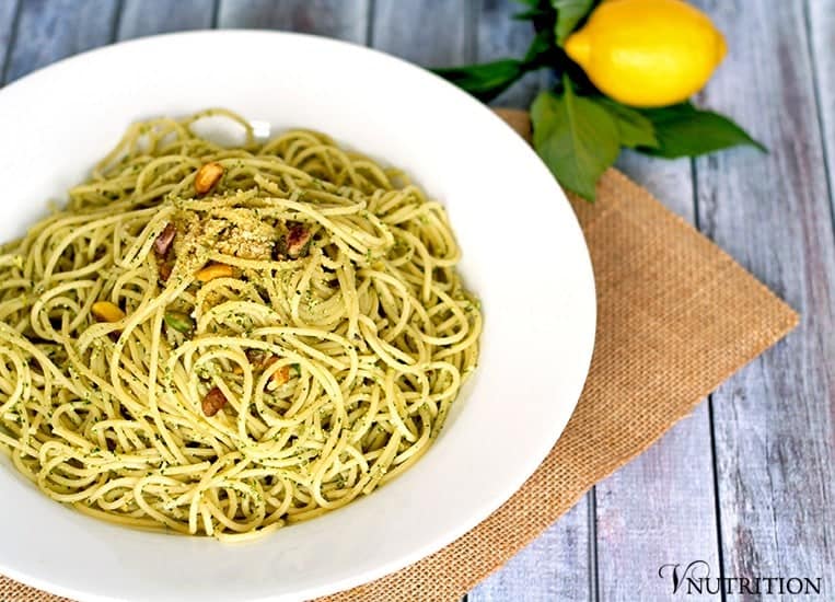 Vegan Pistachio Pesto |This vegan pistachio pesto is a healthy twist on traditional pesto using less oil and switching pine nuts for pistachios. | Check out the recipe or pin for later!