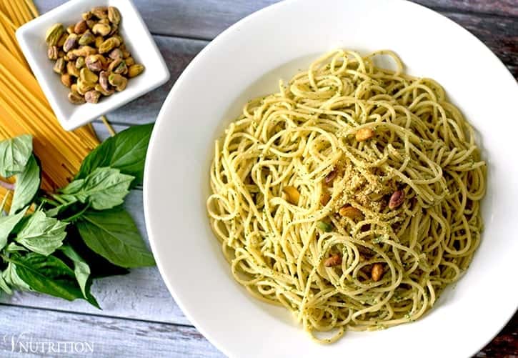 Vegan Pistachio Pesto |This vegan pistachio pesto is a healthy twist on traditional pesto using less oil and switching pine nuts for pistachios. | Check out the recipe or pin for later!