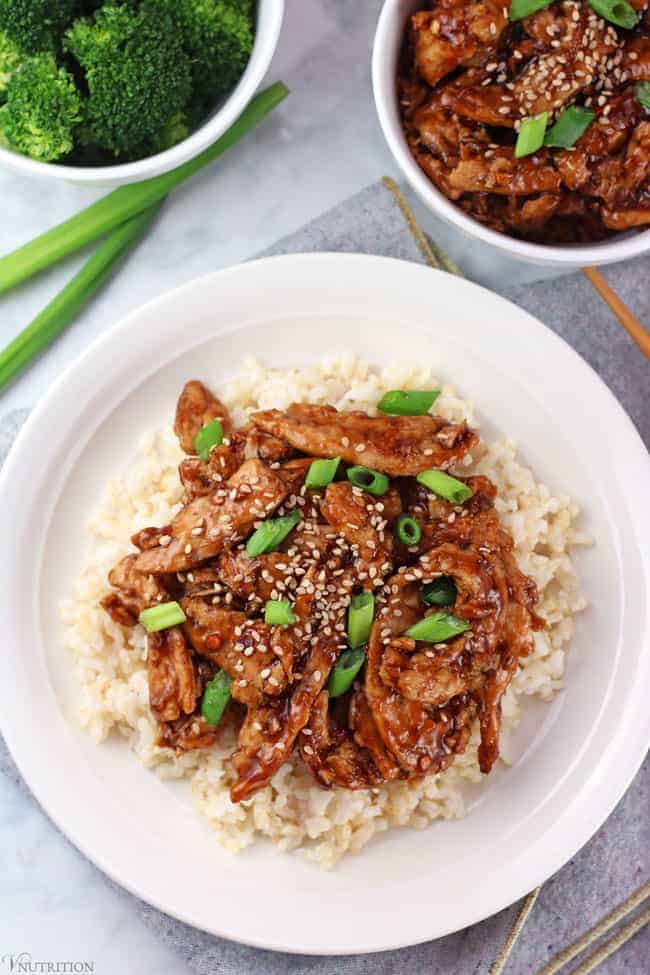 overhead shot of a plate of Mongolian Soy Curls on a white plate on a grey tablescape