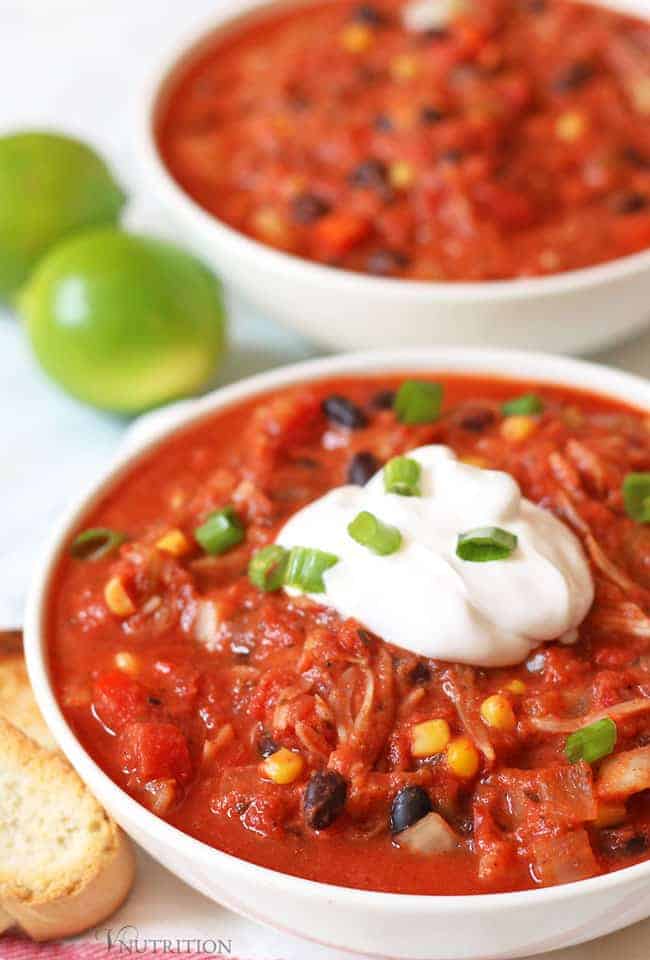 Easy Slow Cooker Vegan Jackfruit Chili topped with vegan sour cream.