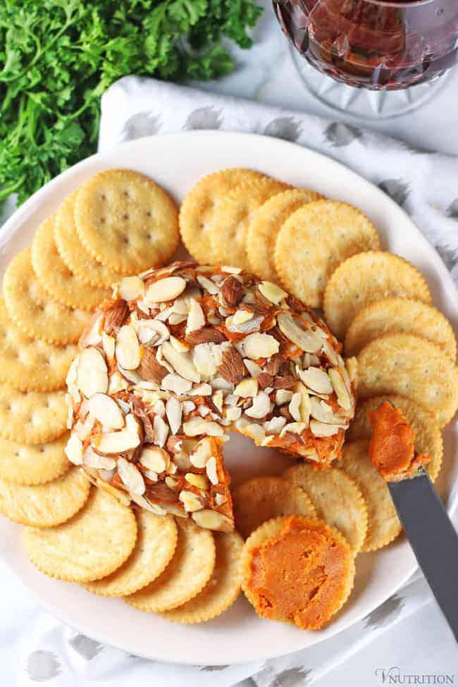 overhead shot of a plate of vegan port wine cheese ball