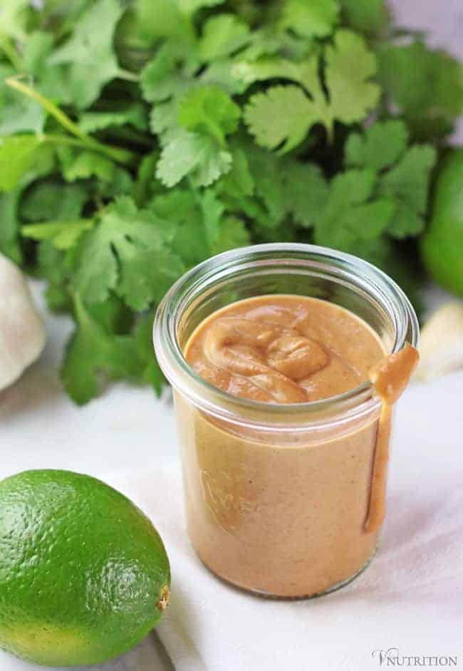 Easy Vegan Peanut Sauce | This easy and quick Asian inspired peanut sauce can be used in so many meals dishes - spring rolls, bowls, noodles, tofu or dressing for salad. It's homemade, healthy, delicious and so simple to make you'll think of a dozen reasons to keep some in the fridge at all times. Quick and Easy Peanut Sauce
