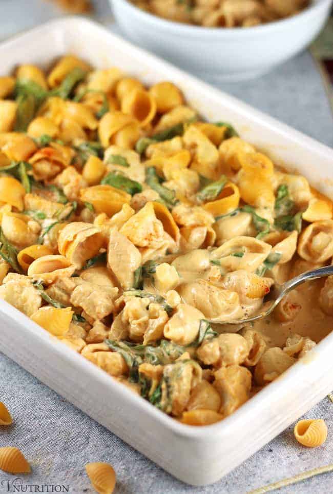 Vegan Buffalo Cauliflower Mac and Cheese in a white casserole dish.