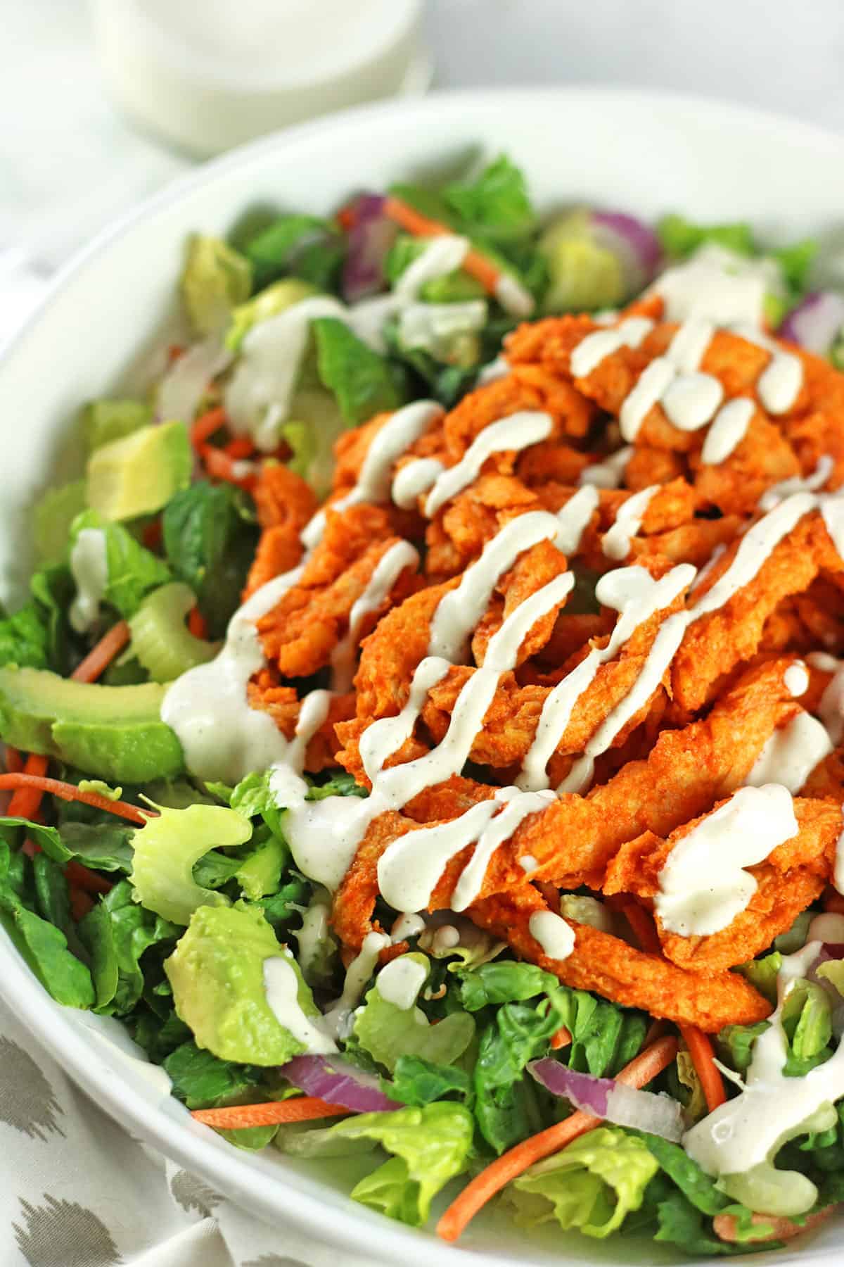 Vegan Buffalo Chicken Salad with buffalo sauce and Ranch Dressing