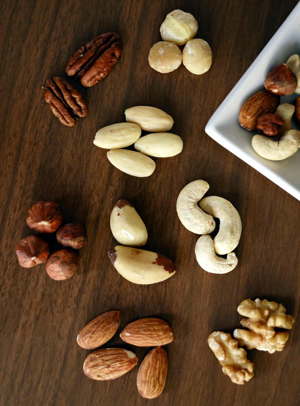 selection of nuts on a wooden table