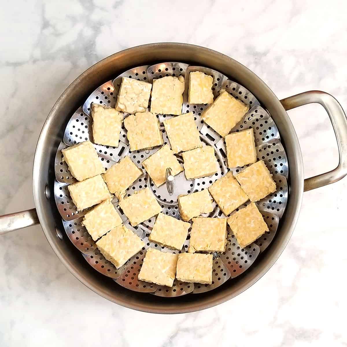 tempeh steaming in pan