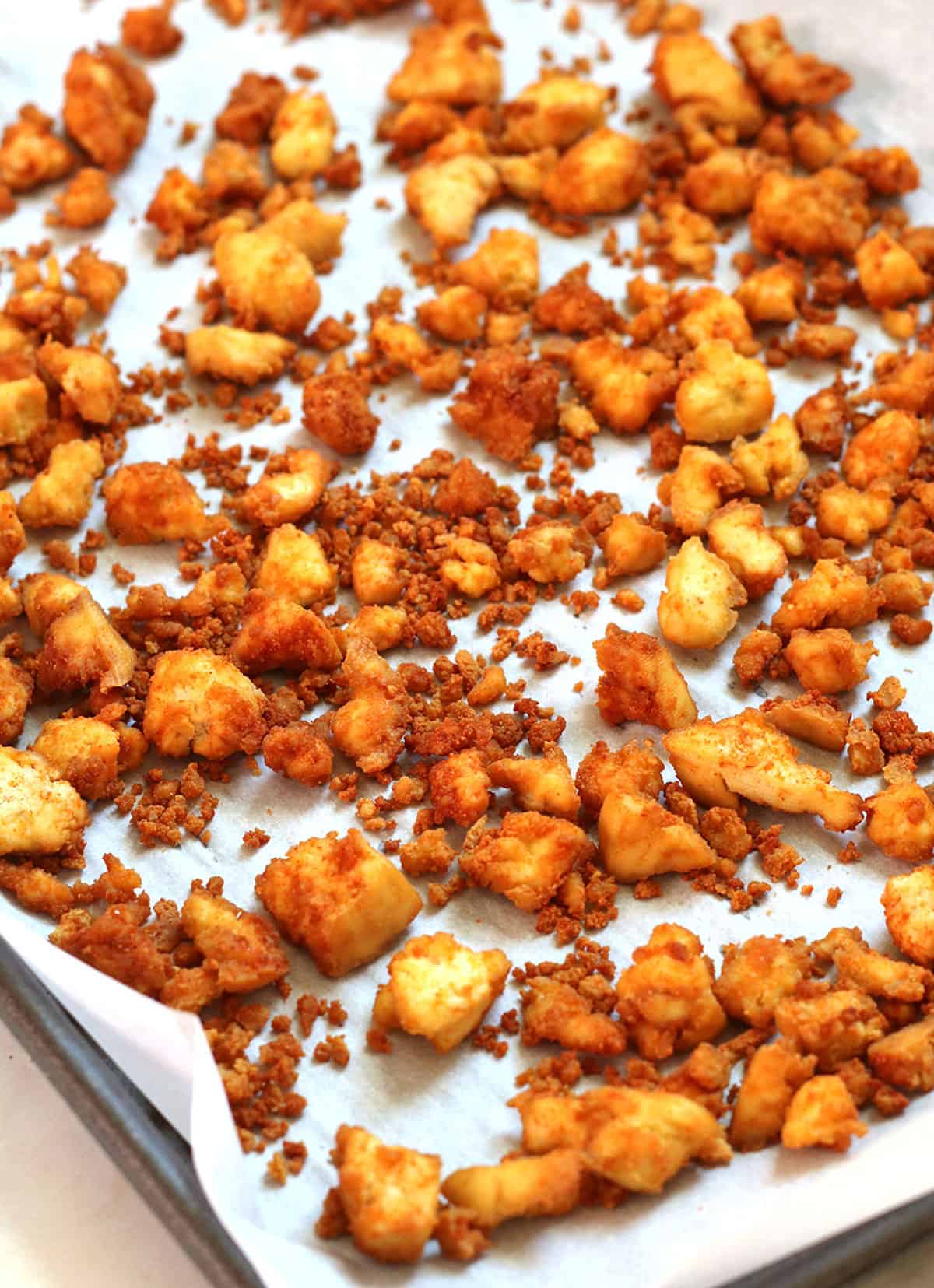 crumbled tofu on baking pan