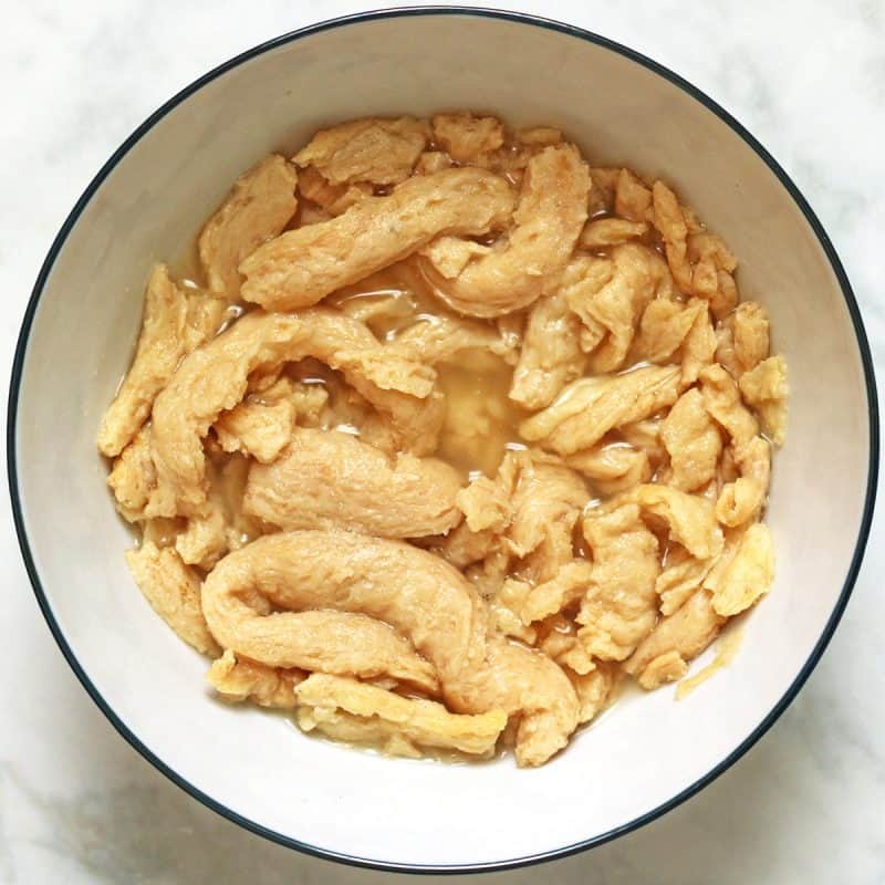 soaking soy curls in vegan chicken broth to rehydrate.