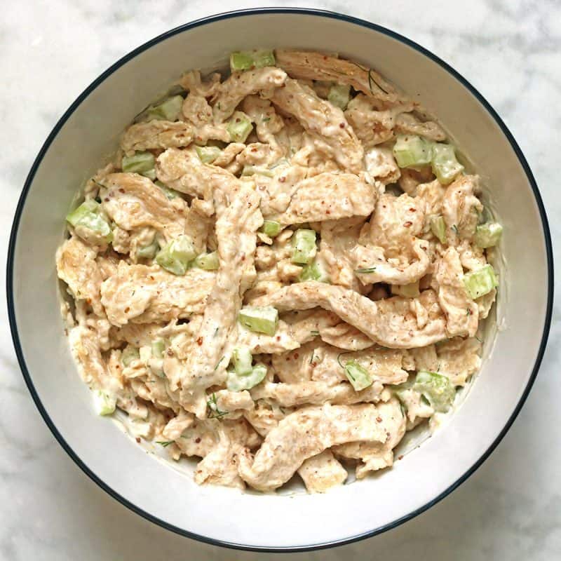 finished vegan chicken salad in a bowl after tossing with mayo-based dressing.