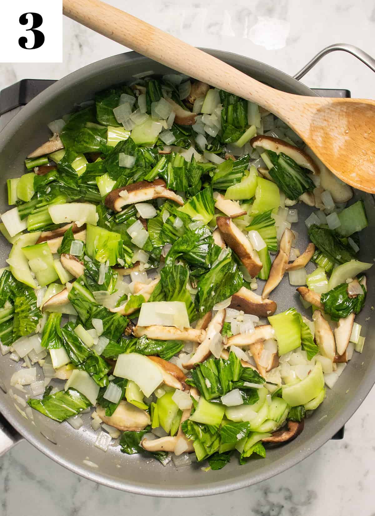 cooking bok choy and mushrooms